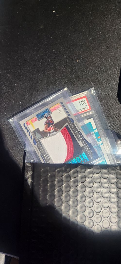 Fire Pack- 1 Encased or Graded Card Plus 1 Rookie, auto or Patch Card