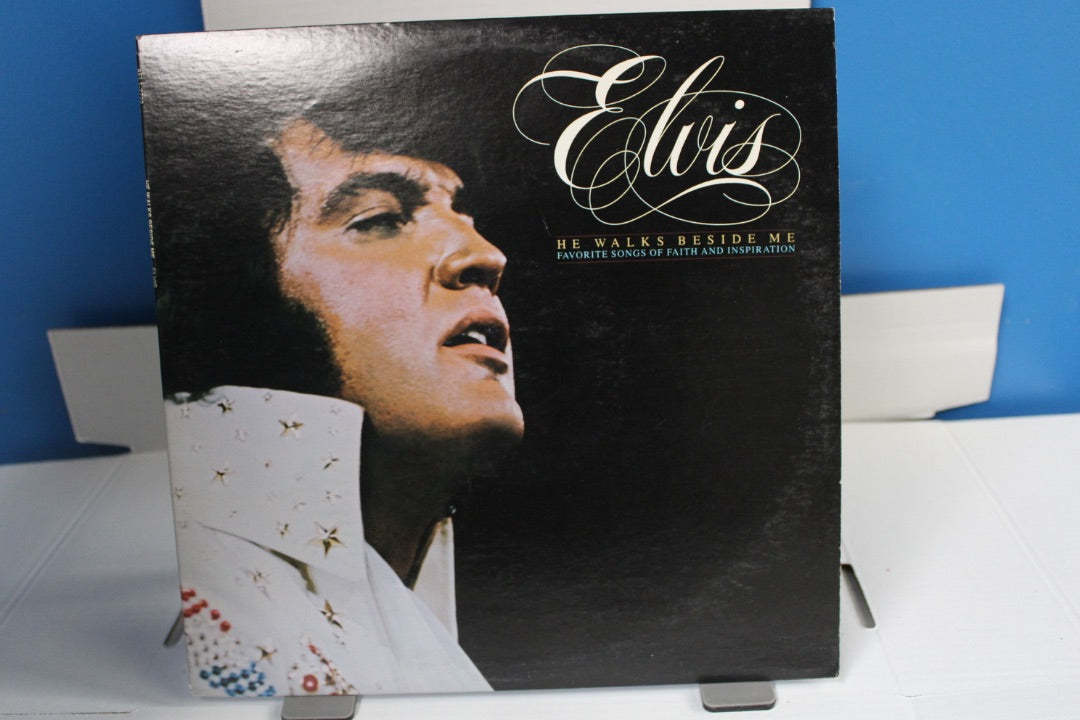 Elvis He walks besides me