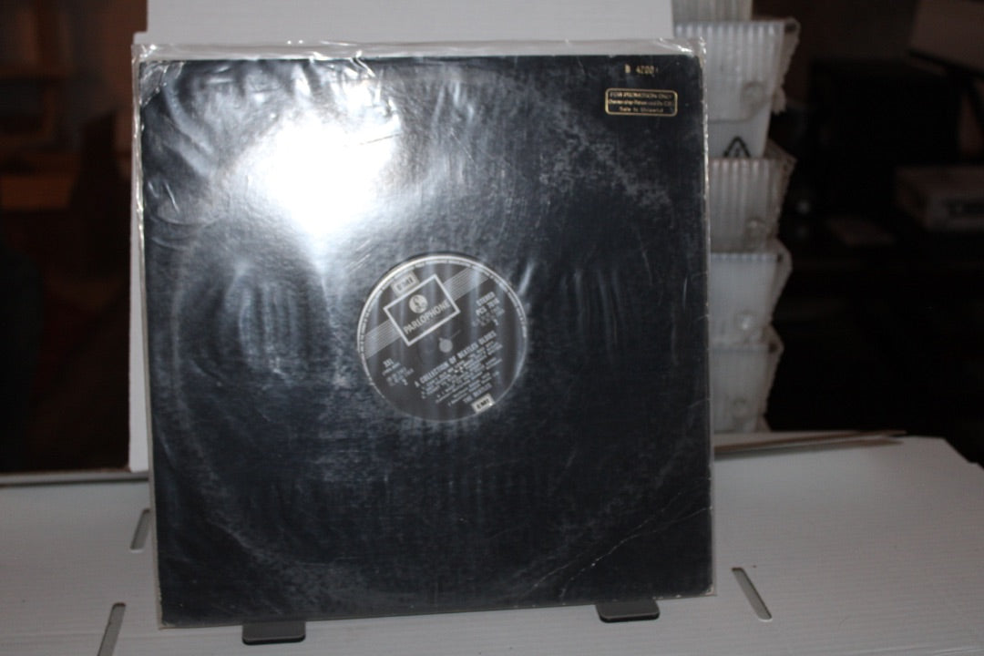 a collection of beatles oldies vinyl PROMO
