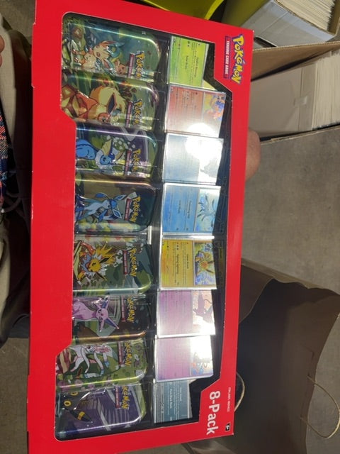 Prismatic evolutions 8 pack mini tin