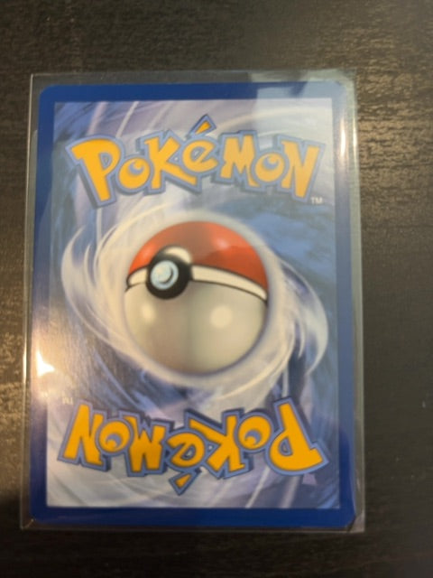 Team Rocket's Spidops 020/182 Reverse Holo