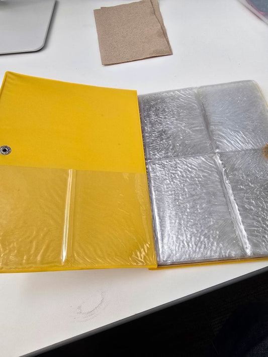 Empty vintage Master Quest binder