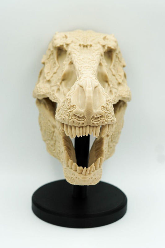 Intricately Carved Tyrannosaurus Rex Skull – Artisan Fossil Replica with Floral and Ornamental Detailing