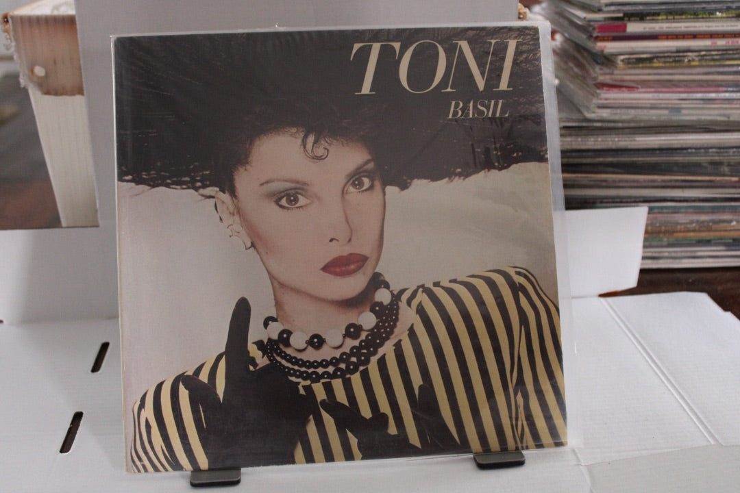 TONI BASIL
