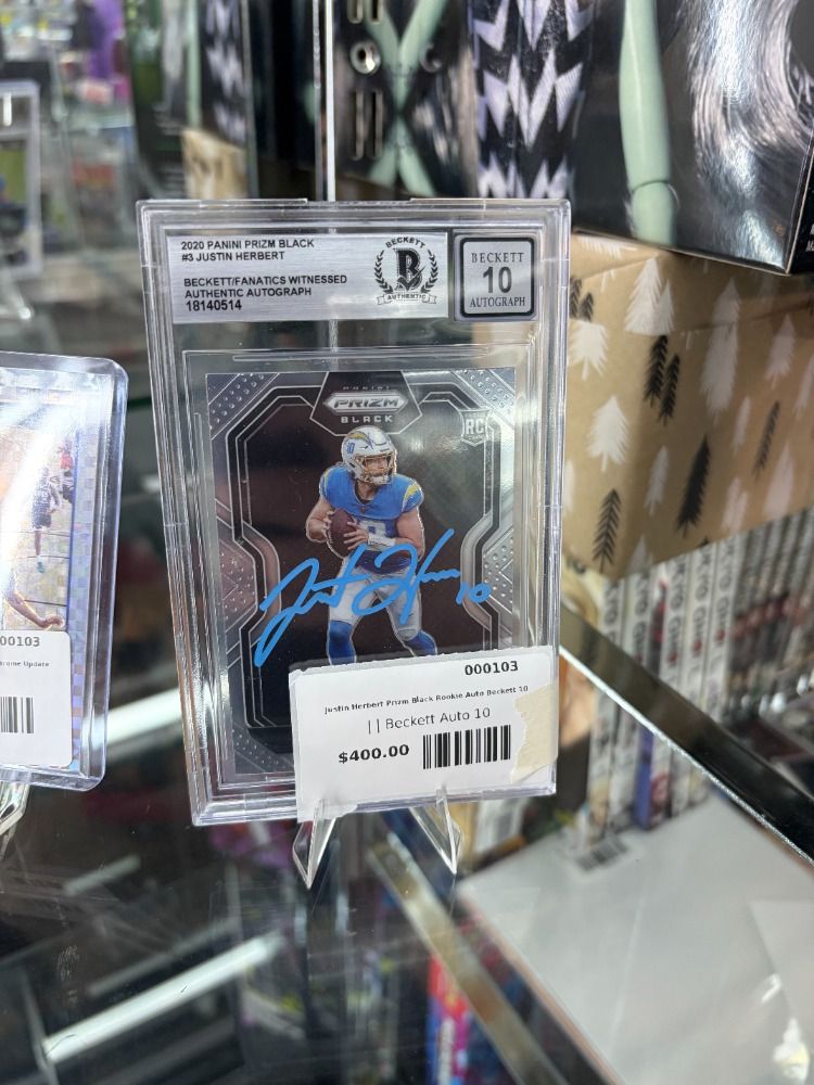 Justin Herbert Prizm Black Rookie Auto Beckett 10