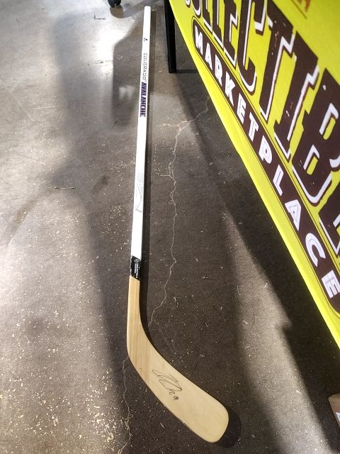 Nate MacKinnon autographed Avalanche hockey stick with certificate