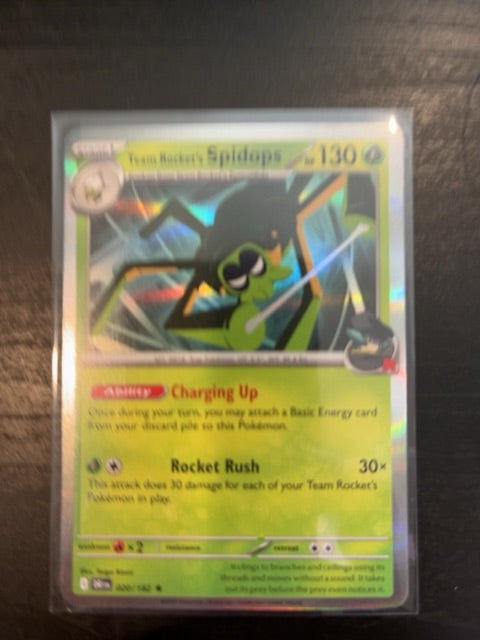 Team Rocket's Spidops 020/182 Reverse Holo